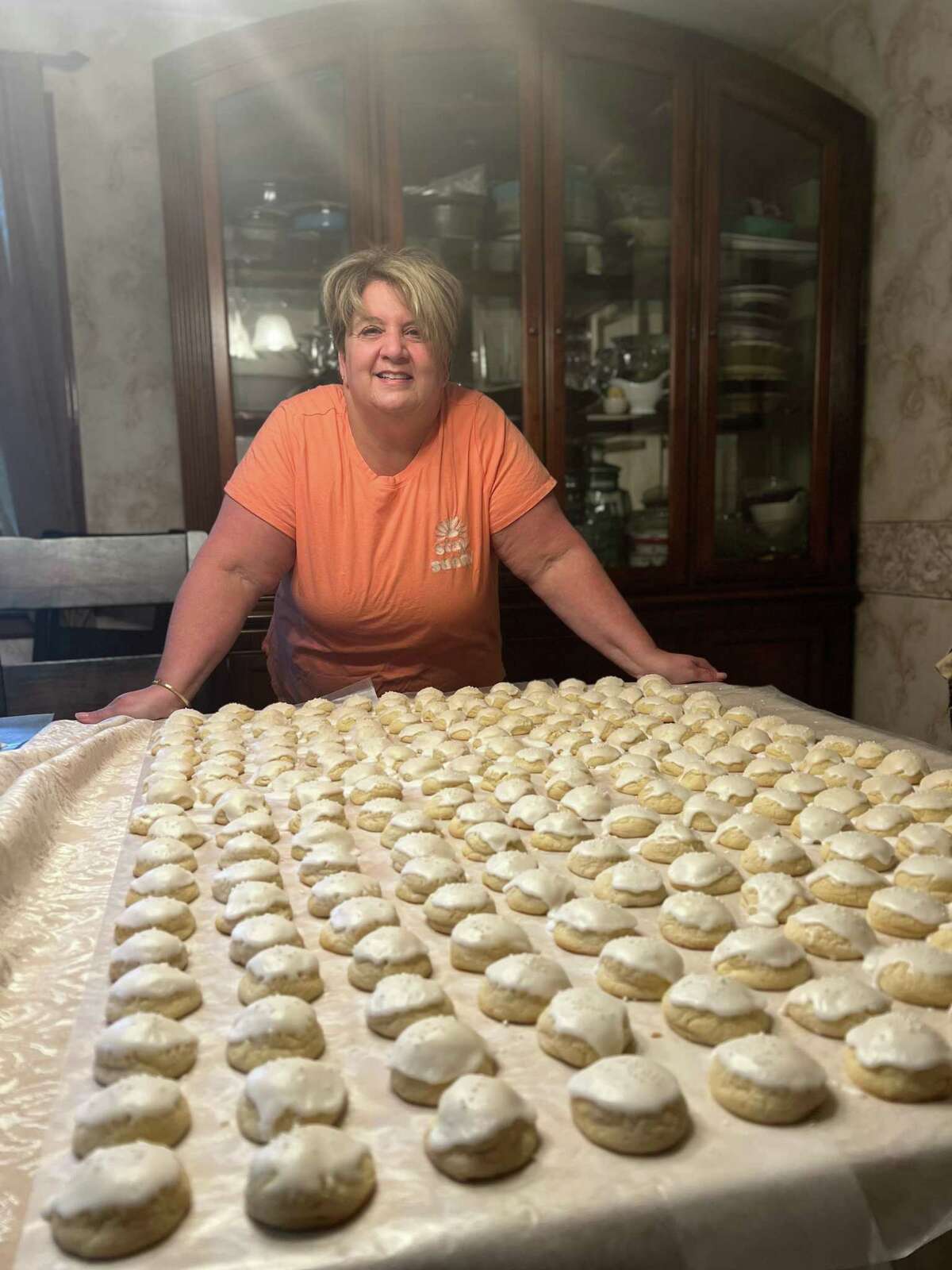 Lisa Vuillemot of Burlington bakes her “famous” anisette cookies. She joined a group called the Wedding Community Cookie Table group on Facebook, which this week sent 1,000 dozen cookies and gifts to the community of Uvalde, Texas.