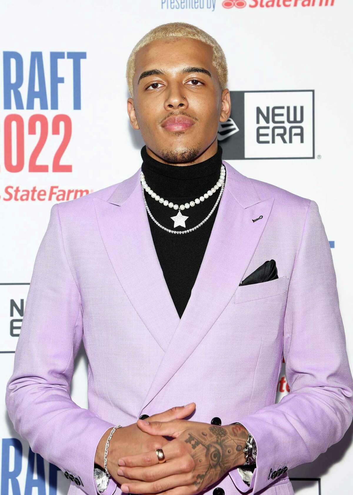 Jeremy Sochan poses for photos on the red carpet during the 2022 NBA Draft at Barclays Center on June 23, 2022 in New York City.