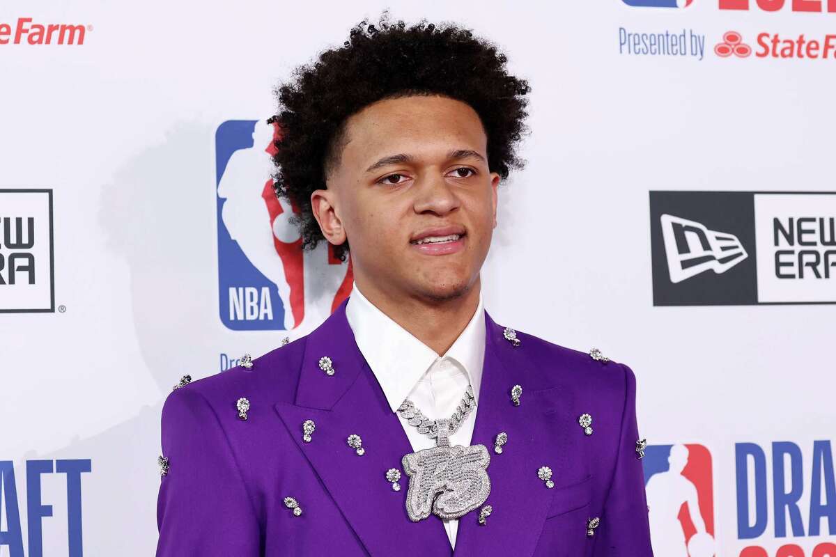 Paolo Banchero poses for photos on the red carpet during the 2022 NBA Draft at Barclays Center on June 23, 2022 in New York City.