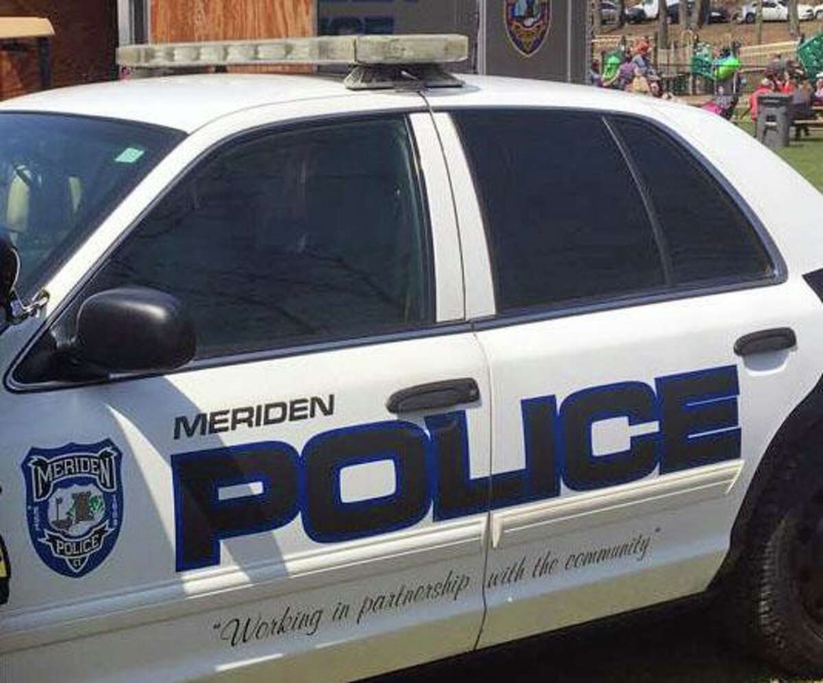 A file photo of a Meriden, Conn., police cruiser. A 19-year-old man and a juvenile were charged Monday in connection with a shooting at Lourdes Court in Meriden in March. The incident sent one person to the hospital.