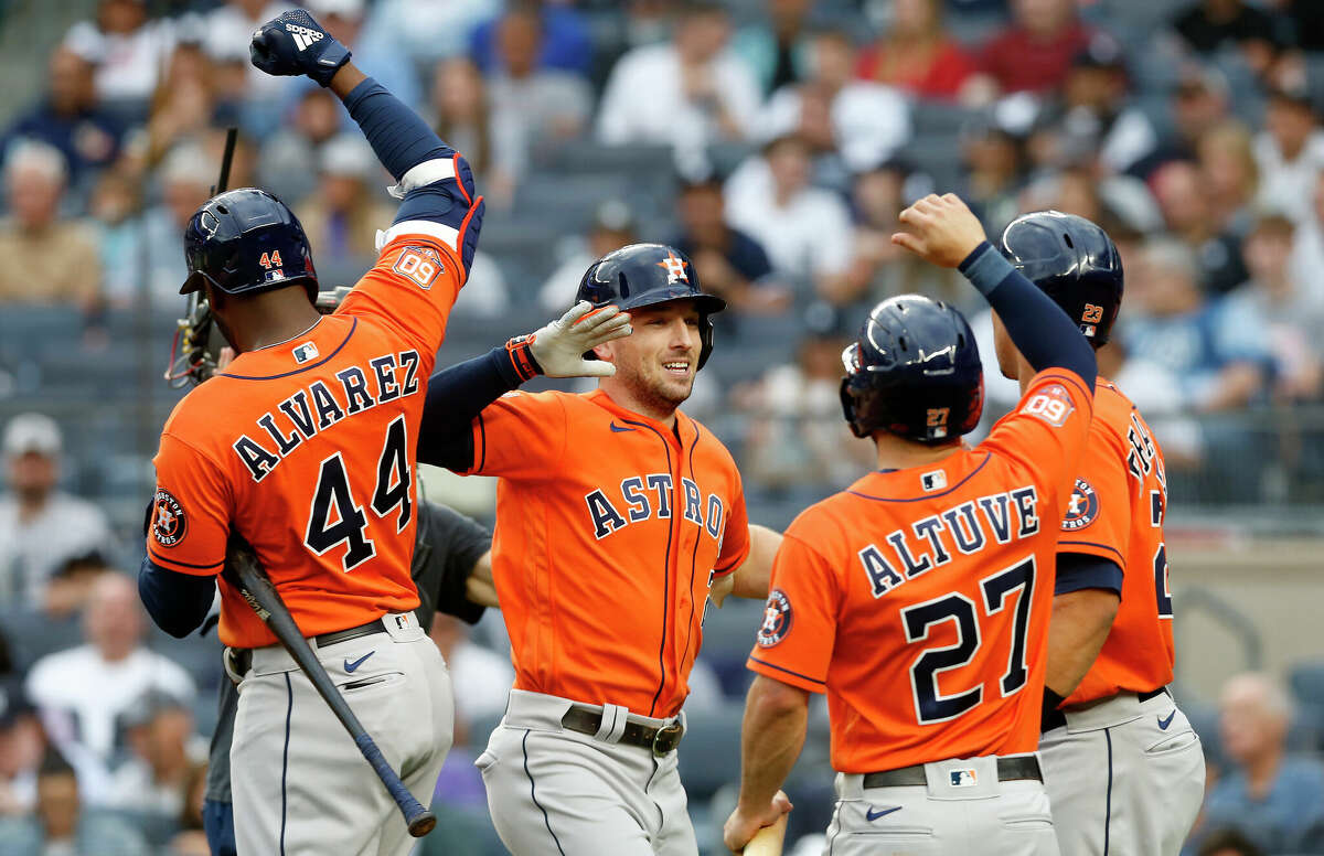 NEW YORK, NEW YORK - JUNE 23: Alex Bregman #2 of the Houston Astros celebrates his first inning three run home run against the New York Yankees with teammates Yordan Alvarez #44, Jose Altuve #27 and Michael Brantley #23 at Yankee Stadium on June 23, 2022 in New York City. (Photo by Jim McIsaac/Getty Images)