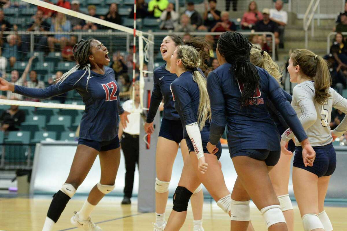 The Falcons celebrate a point during the second set of a 6A-III quarterfinal playoff match between the Ridge Point Panthers and the Tompkins Falcons on Monday, November 8, 2021 at the Leonard Merrell Center, Katy, TX.