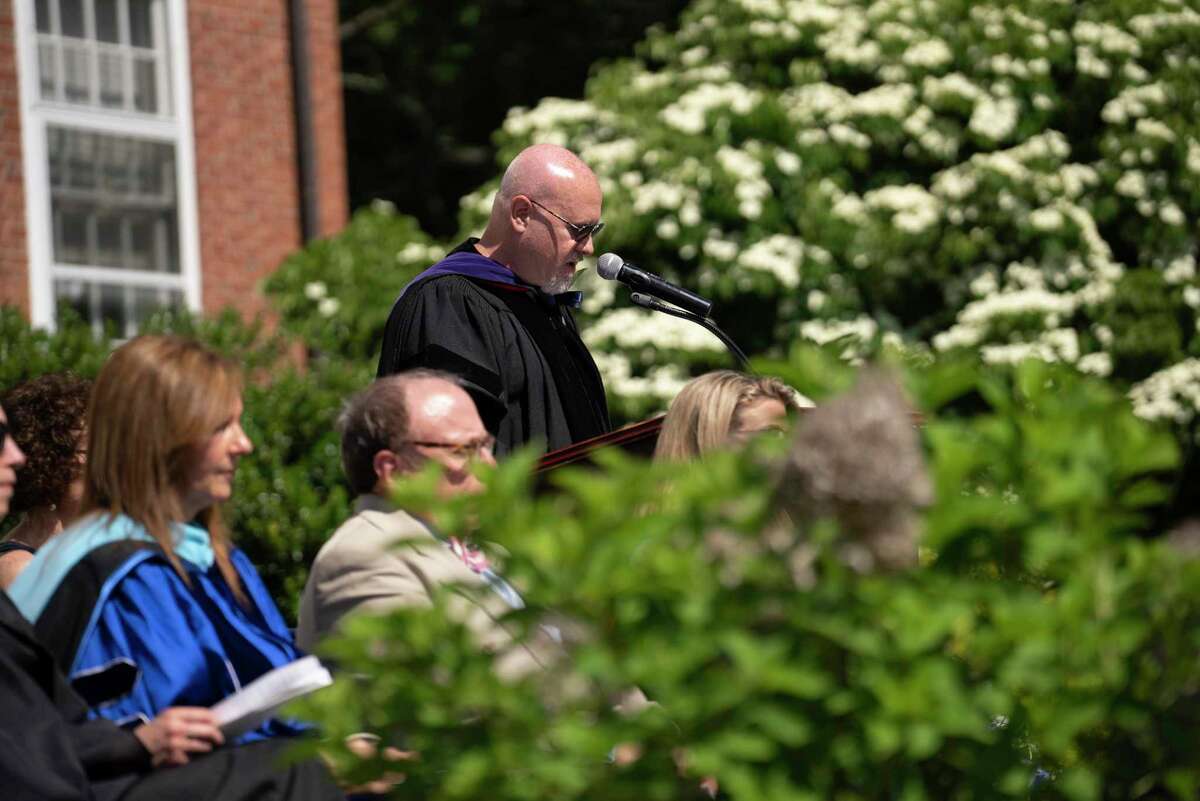 Shepaug Valley High School Principal Don Schels speaks at the graduation ceremony for Shepaug Valley High School on June 11 at Bryan Memorial Town Hall.