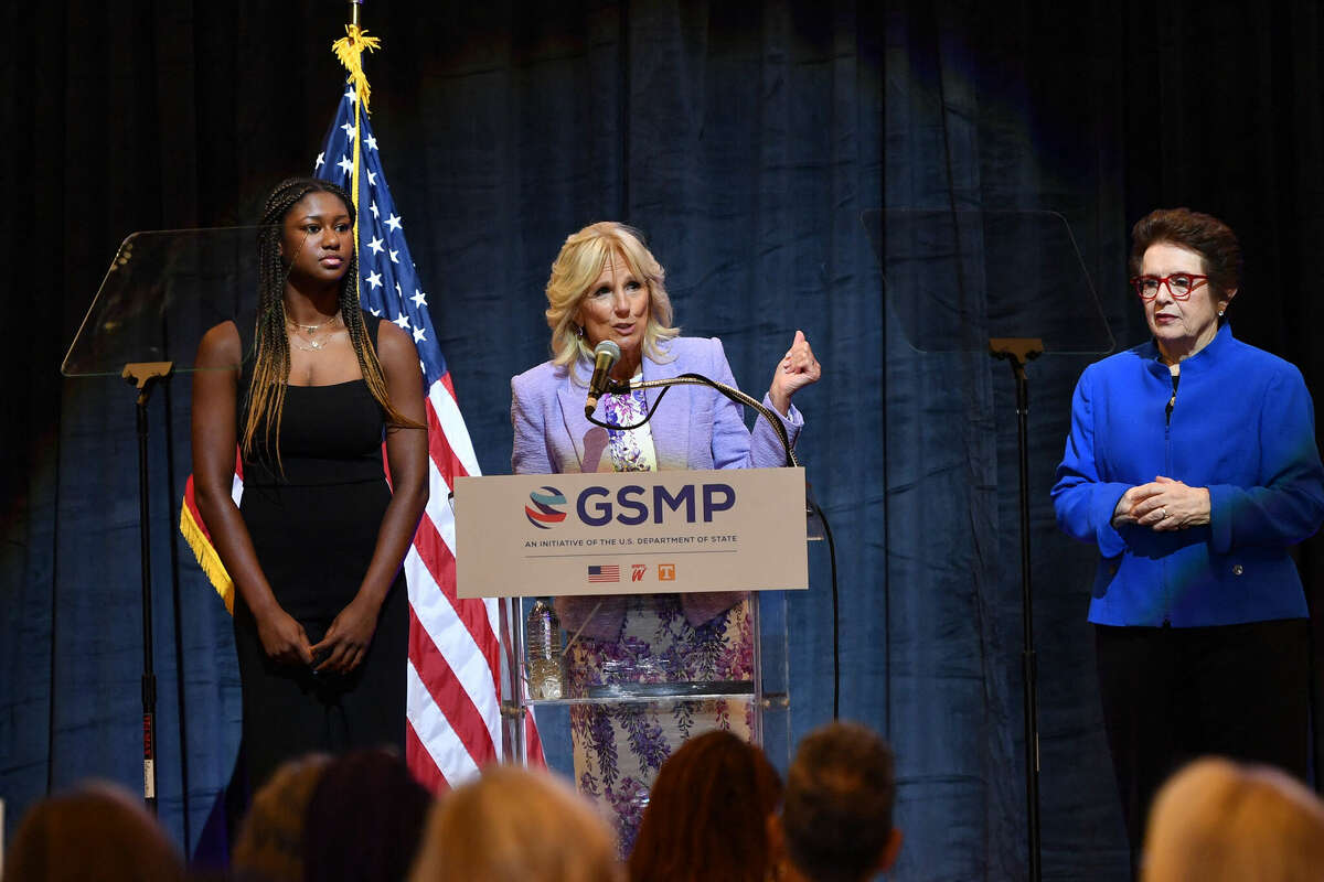 Tennis legend Billie Jean King (right) and high school track athlete Maya Mosley (left) listen Wednesday to first lady Jill Biden speak during an event at Capitol One Arena in Washington, D.C., to mark the 50th anniversary of Title IX. - Title IX, the federal civil rights law that prohibited sex-based discrimination in educational programs that receive federal financial assistance, was signed on June 23, 1972.