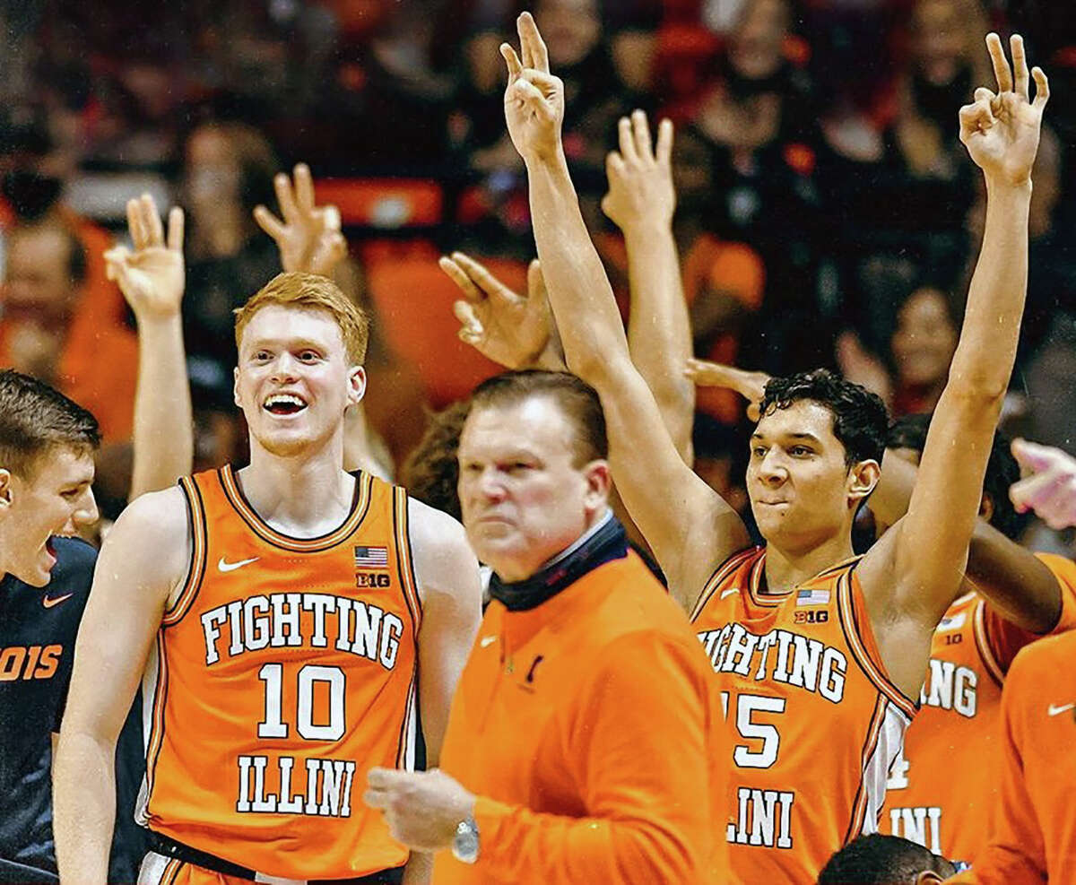 The University of Illinois will face Syracuse as part of the Big 10-ACC Challenge  next season. Above, head coach Brad Underwood and his team celebrate a win last season.