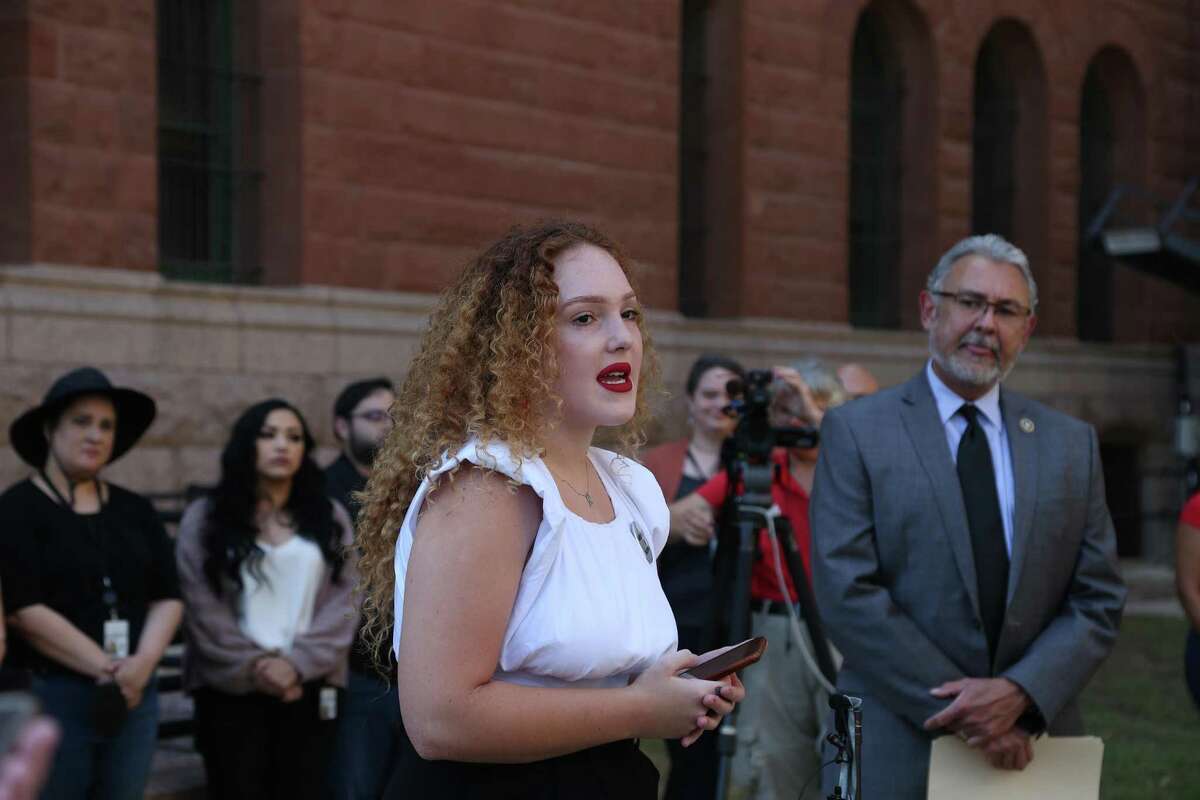Bexar County District Attorney Joe Gonzales listens to Makayla Montoya of the Buckle Bunnies Fund discussing the recently issued Supreme Court opinion overturning Roe v. Wade on Friday at the Bexar County Courthouse.