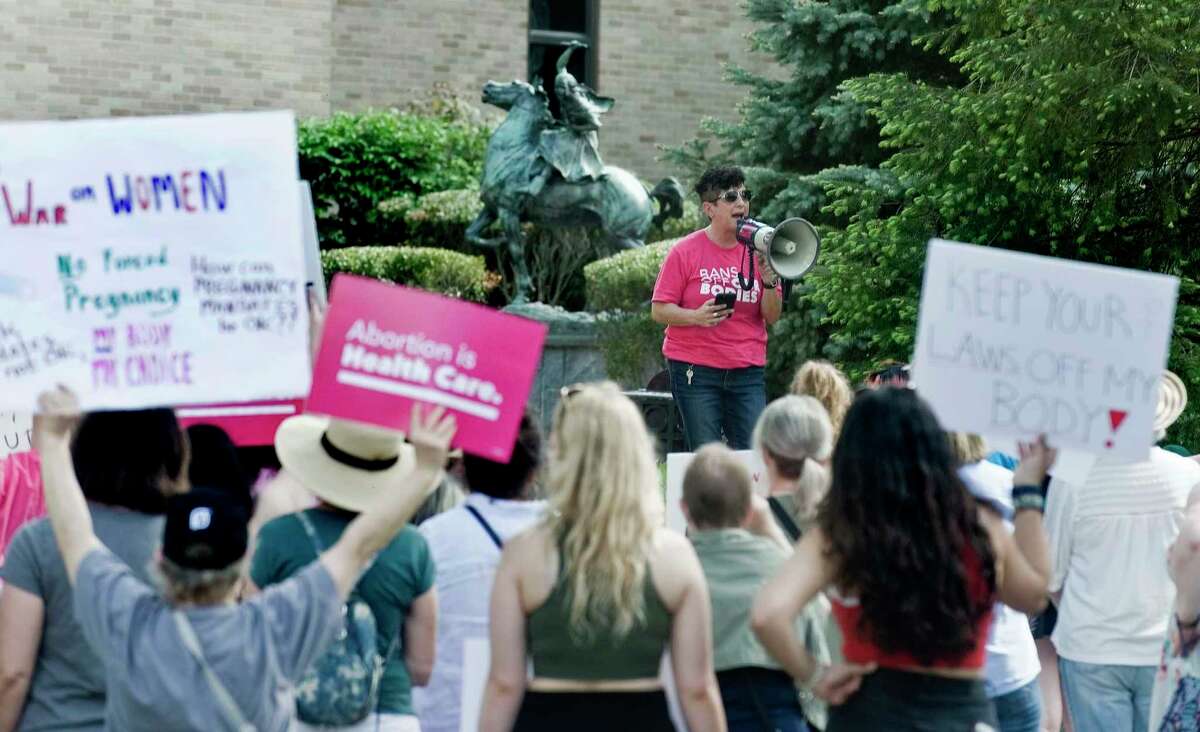 Gretchen Raffa, policy director of Planned Parenthood for Connecticut and Rhode Island, speaks during a rally in support of abortion rights at the Danbury Library Plaza. Sunday, May 15, 2022
