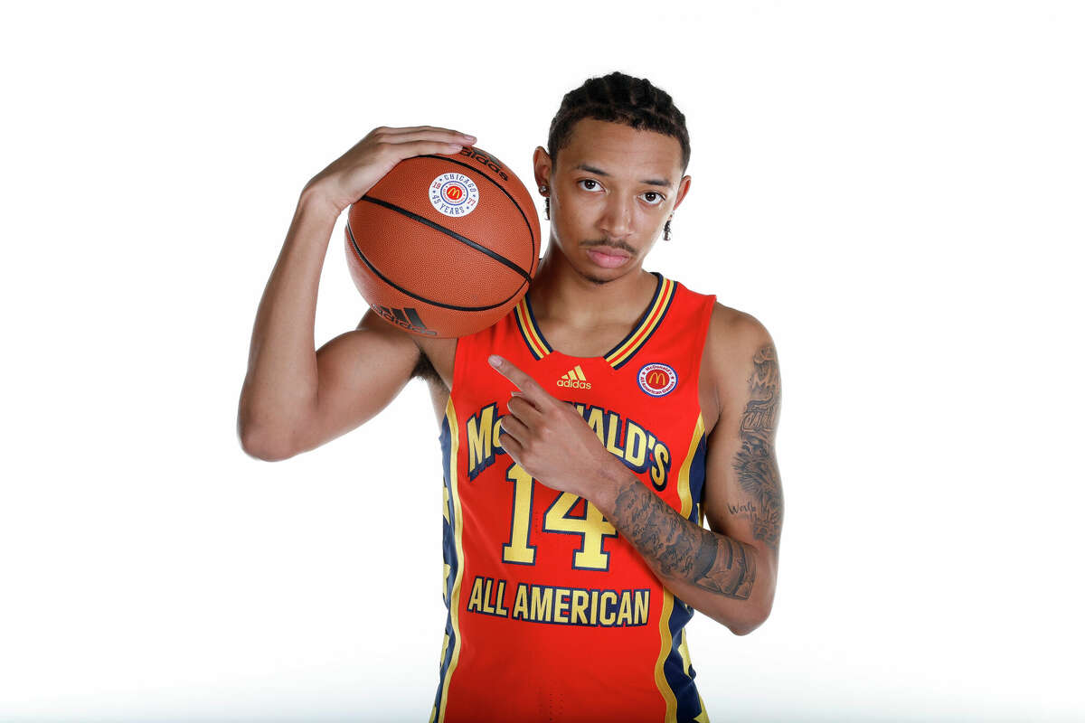 McDonald's High School All American Nick Smith Jr. (14) poses for a photo on Portrait Day March 26, 2022