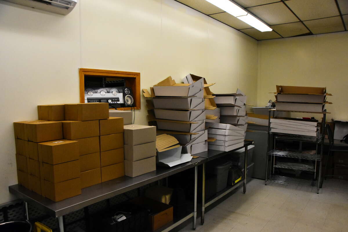 Boxes at Zachary's Pastry Shoppe in East Greenbush await cakes, cupcakes and other baked treats ordered for parties and weddings this weekend.&nbsp;