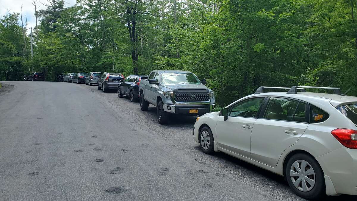 Cars parked along Platte Clove Road in Hunter, Greene County, near the Huckleberry Point Trailhead.