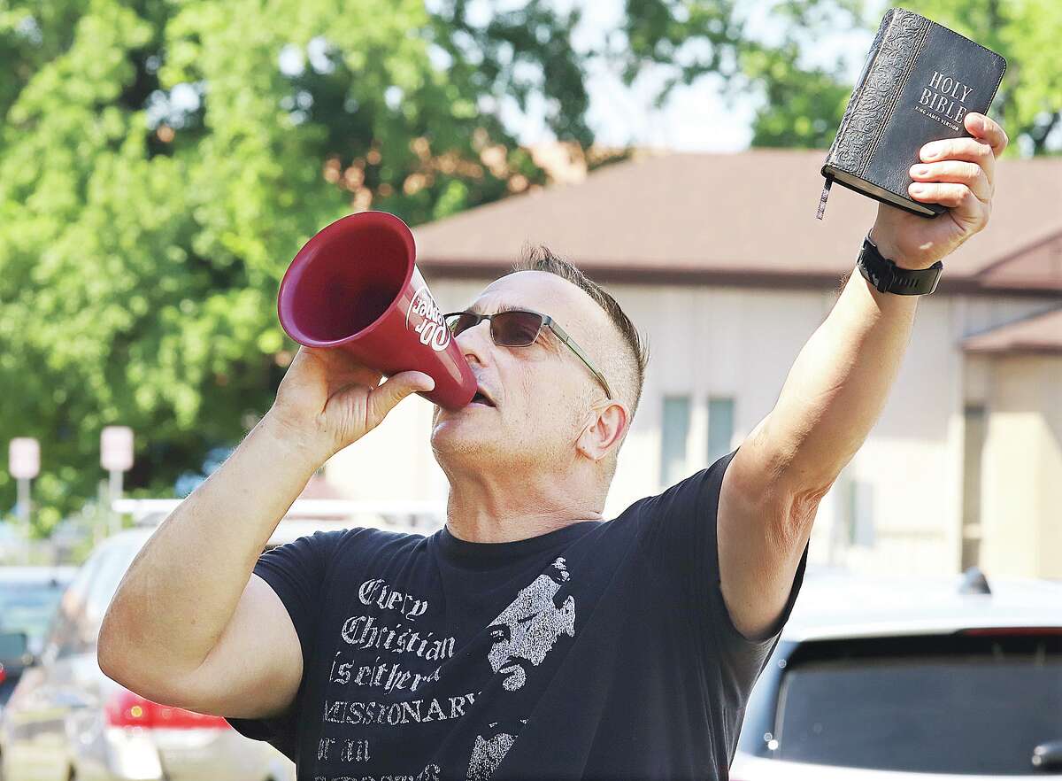 A group of about a dozen pro-life protesters were at the Hope Clinic for Women in Granite City on June 24. Standing just off the clinic's property, one man used a bullhorn to shout at women inside the clinic on the second floor. The U.S. Supreme Court recently struck down the constitutional right to an abortion, sending that decision back to the individual states.