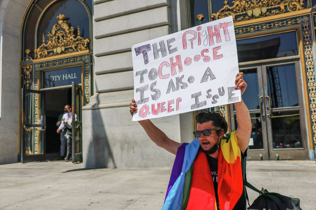 Chris Nigoghossian protests after the Supreme Court overturned Roe v. Wade outside City Hall on Friday, June 24, 2022 in San Francisco, California.
