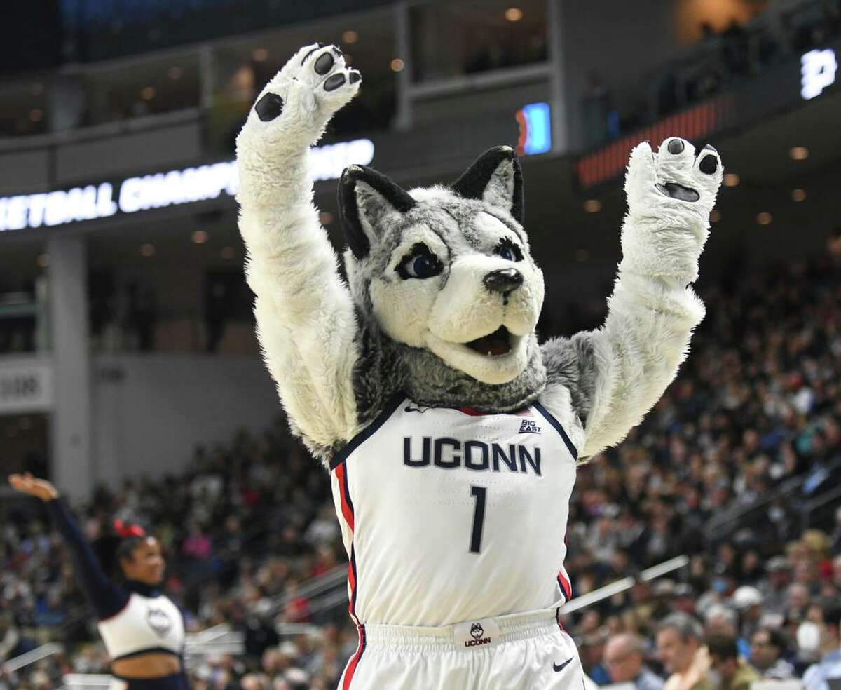 Photos from No. 2 UConn's 91-87 double overtime win against No. 1 NC State in the NCAA women's basketball tournament Elite Eight matchup at Total Mortgage Arena in Bridgeport, Conn. Monday, March 28, 2022.