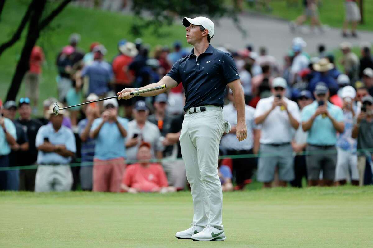 Rory McIlroy reacts to a putt on the 14th green during the second round of the Travelers Championship at TPC River Highlands on Friday in Cromwell.
