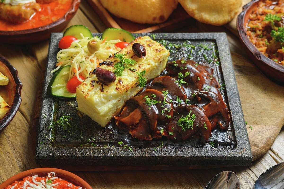 Bërxollë Dukagjini, pounded veal, kashkaval cheese topped with mushroom gravy at Çka ka Qëllu in Stamford.