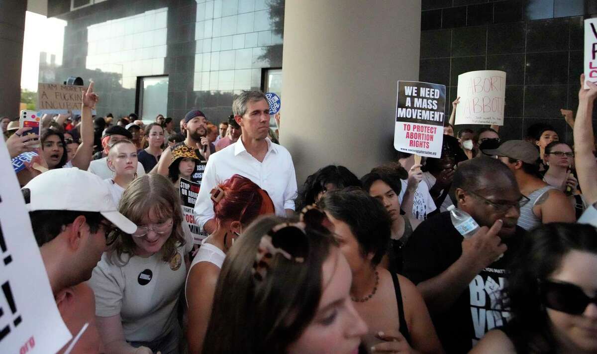 Beto O’Rourke listens to the speakers during a protest against the Supreme Court’s decision to reverse Roe v. Wade at the Federal Courthouse on Friday, June 24, 2022 in Houston.