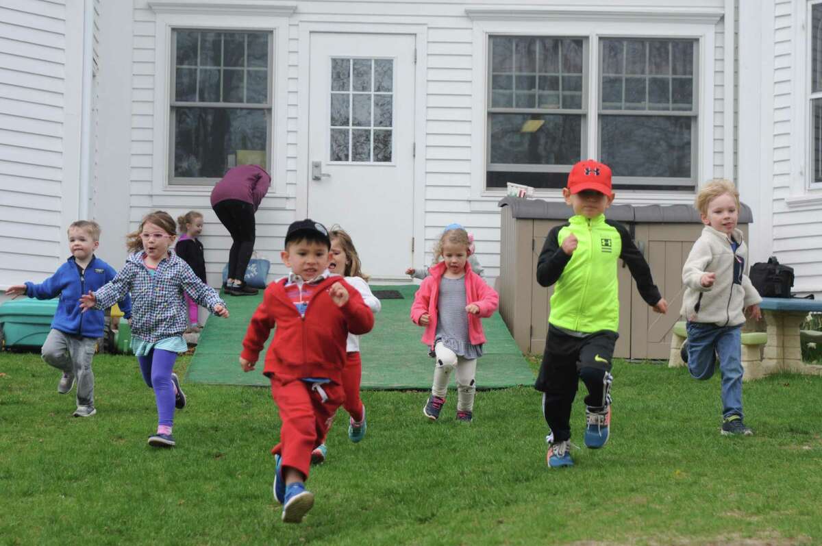 Ridgefield Community Kindergarten has been asked to vacate the Lounsbury House by June 30, 2023. In this 2019 file photo, students at Ridgefield Community Kindergarten run outside the Lounsbury House.