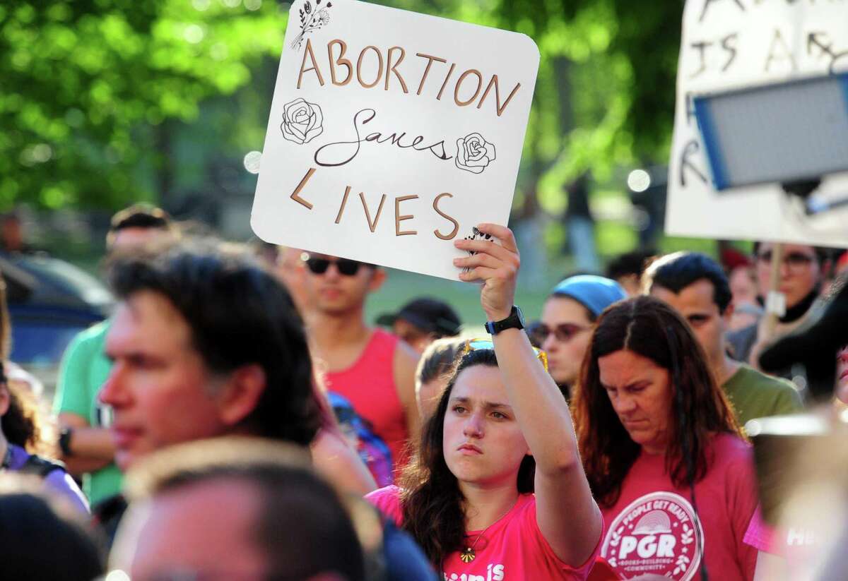 A rally is held to protest the overturning of Roe v Wade in front of the federal courthouse on Church Street in downtown New Haven, Conn., on Friday June 24, 2022.