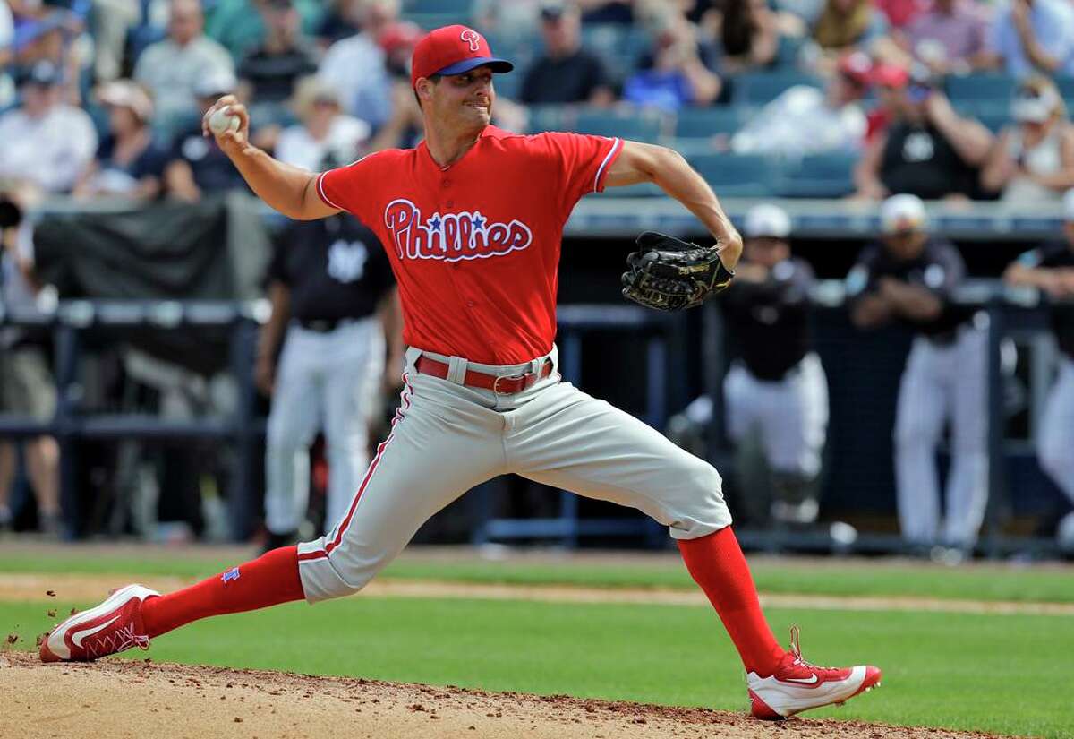 FILE - In this Thursday, March 3, 2016 file photo, Philadelphia Phillies starting pitcher Mark Appel delivers to the New York Yankees during the sixth inning of a spring training baseball game in Tampa, Fla. Appel is a big league ballplayer nine years after he was selected No. 1 overall in the amateur draft. Appel has been promoted by the Philadelphia Phillies. The right-hander, who turns 31 on July 15, went 5-0 with a 1.61 ERA in 19 appearances for Triple-A Lehigh Valley. (AP Photo/Chris O'Meara, File)