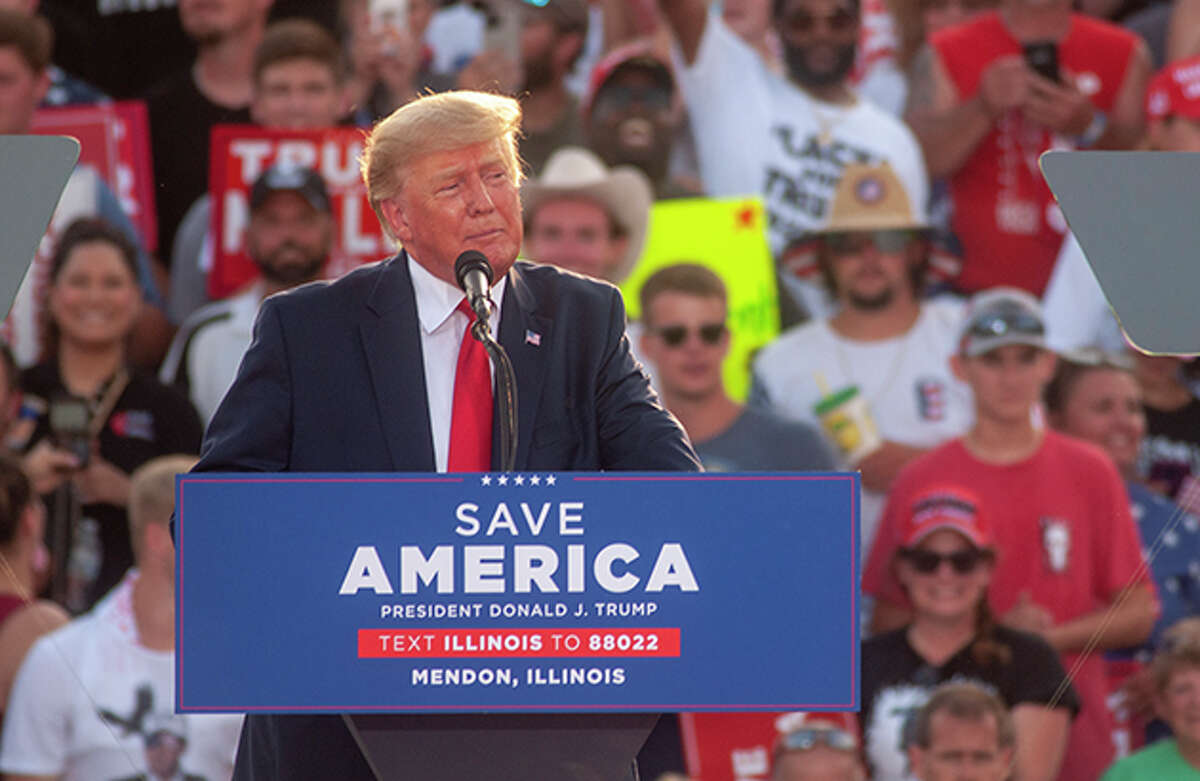 Former President Donald J. Trump speaks at a rally in Adams County, during which he endorsed candidates Mary Miller for Congress in the new 15th District and Darren Bailey for the GOP nomination for governor. Voters will determine Tuesday between Miller and U.S. Rep. Rodney Davis for Congress and select a Republican nominee for governor from among a field of six. 