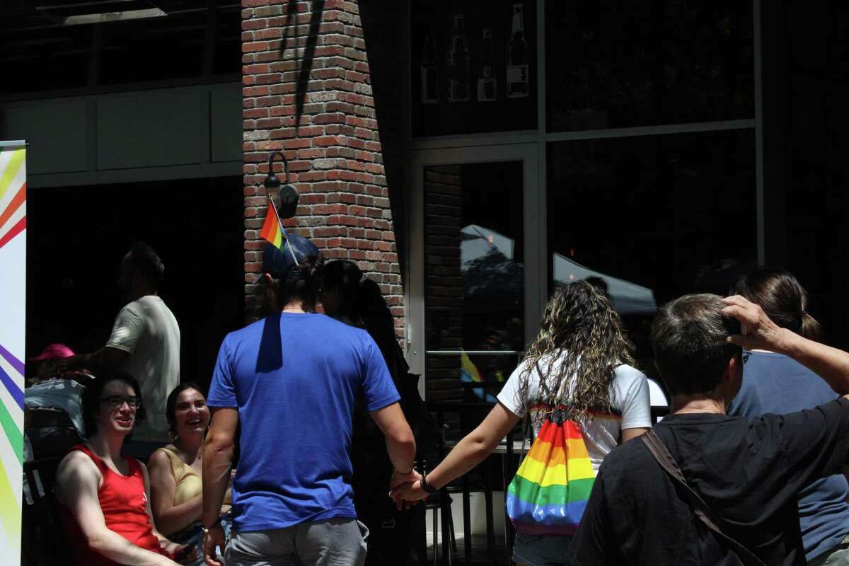 Hundreds of people gathered in Blueback Square in West Hartford Saturday to celebrate Pride. Performers, drag shows and two dozen vendors entertained guests donning rainbow clothing and carrying flags.