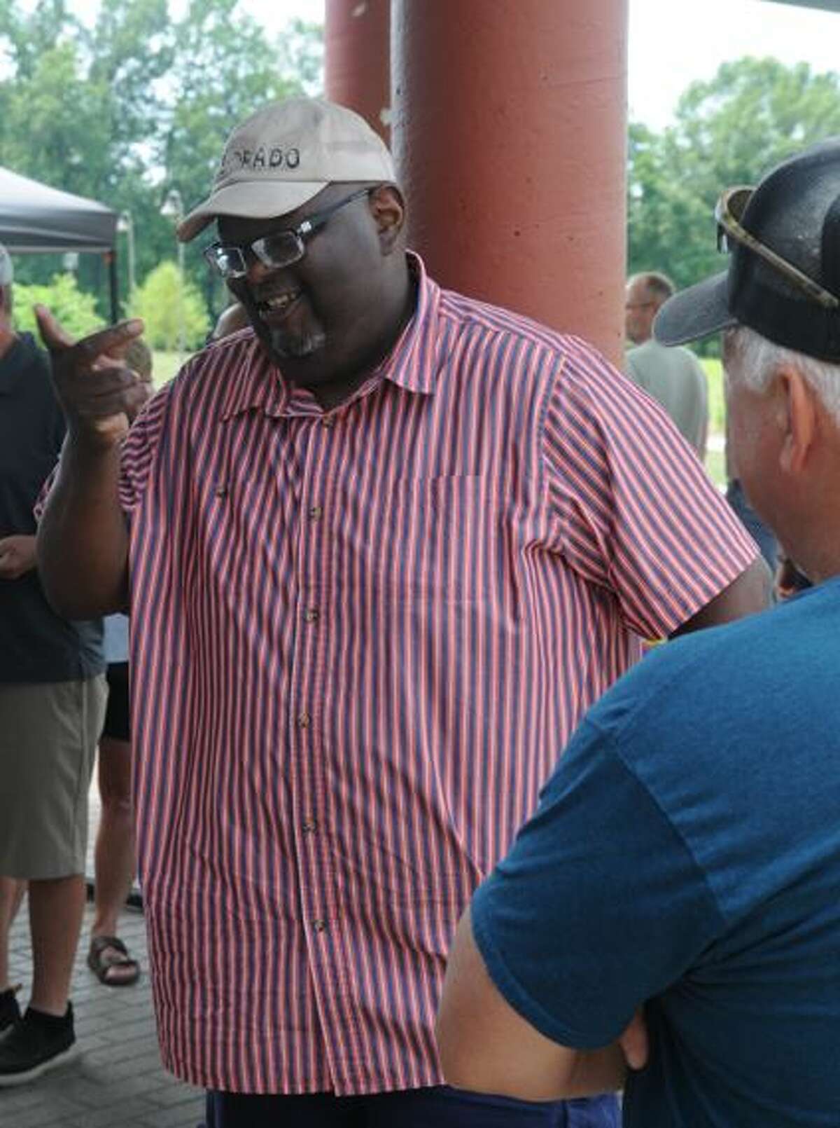 Greg Lowry of Jacksonville enjoys communicating with other visitors during Saturday's Deaf Picnic in Godfrey.