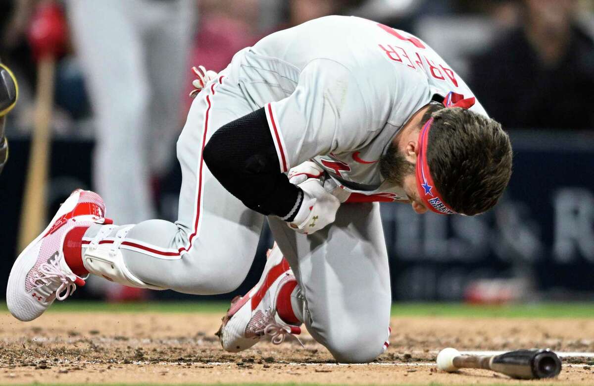 SAN DIEGO, CA - JUNE 25: Bryce Harper #3 of the Philadelphia Phillies reacts after getting hit with a pitch during the fourth inning of a baseball game against the San Diego Padres at Petco Park on June 25, 2022 in San Diego, California. (Photo by Denis Poroy/Getty Images)