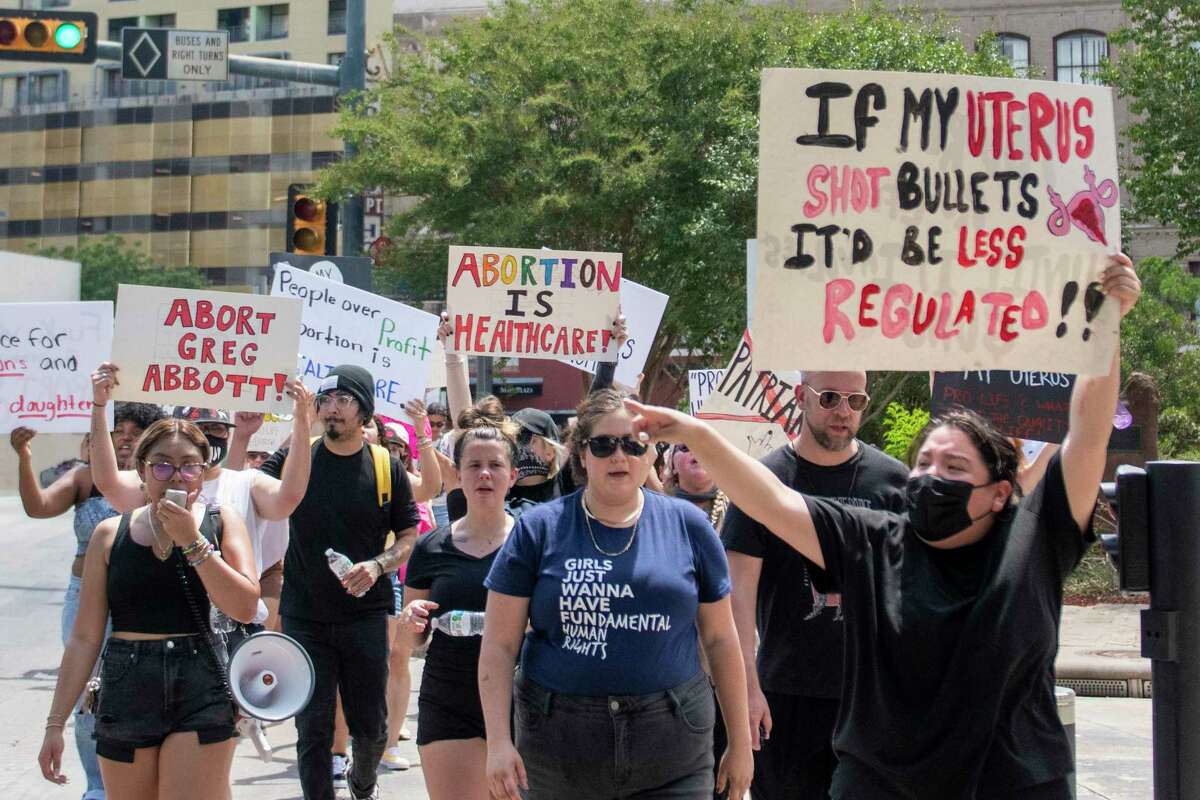 A large group of pro abortion protesters march during a Bans Off Our Bodies rally at the Bexar County Court House in San Antonio on Sunday, June 26th, 2022.