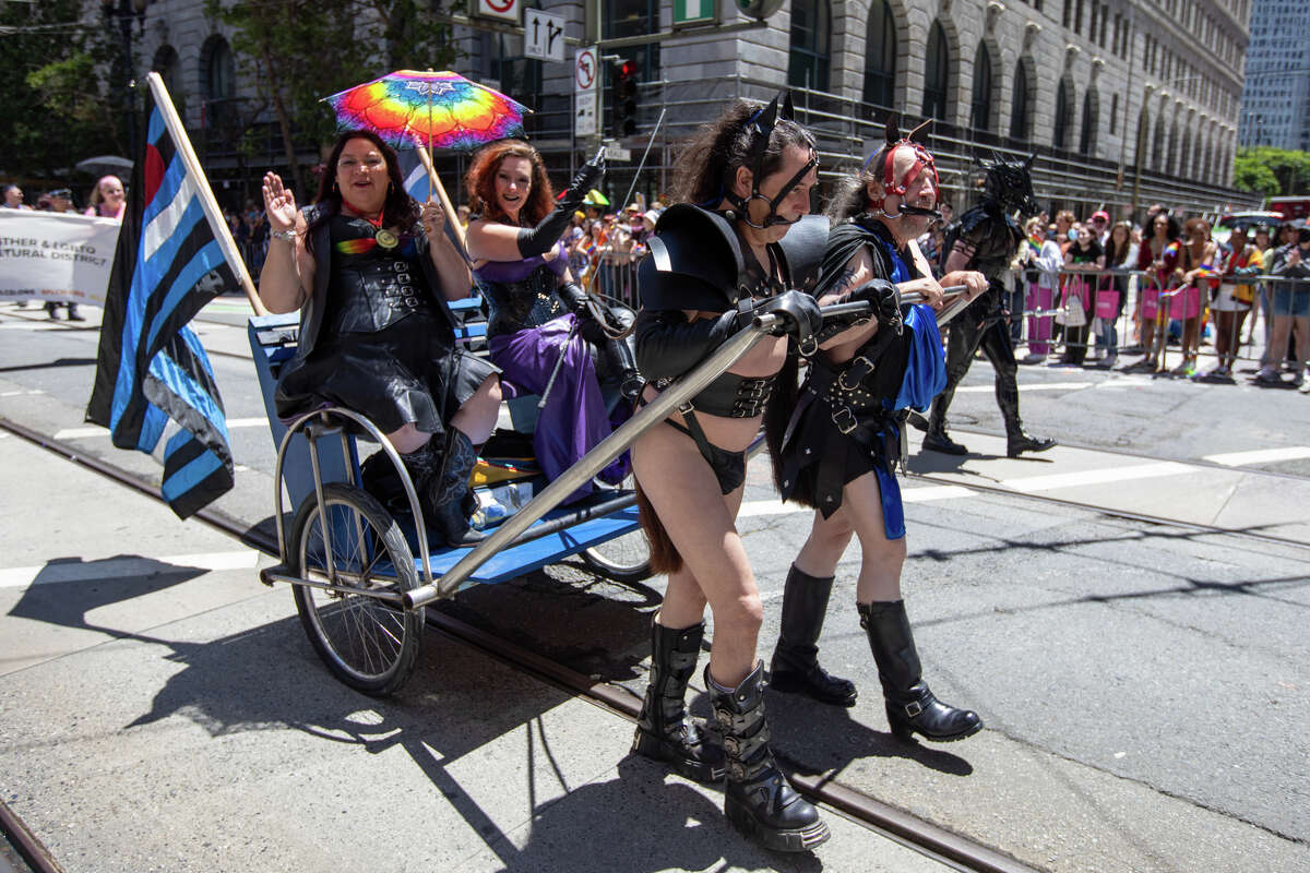 Leather Marshall Tammy LG Hatter is driven along during the the San Francisco Pride parade in San Francisco, Calif. on June 26, 2022.