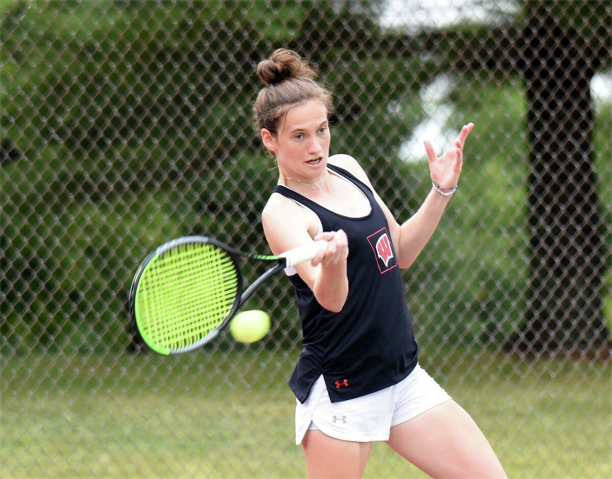 Ava Markham hits a forehand win in the  women's championship match at the Edwardsville Open on Sunday in Edwardsville.