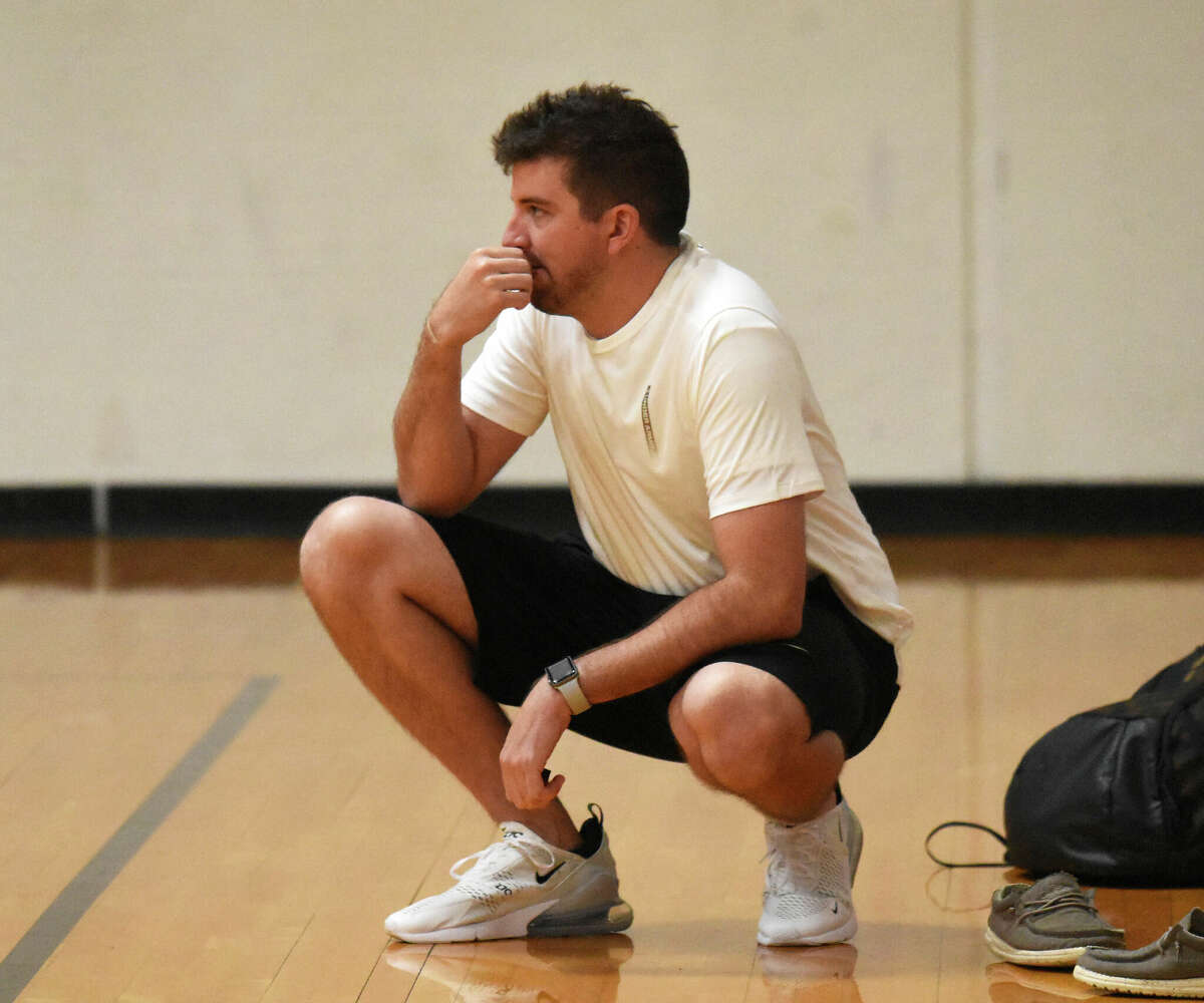Marquette coach Cody Best watches his team play at the Edwardsville NCAA Live Showcase on Saturday at Edwardsville High School.