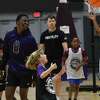 University at Albany basketball player Will Amica, left, plays with children attending Coach Dwayne Killings’ summer basketball camp on Monday, June 27, 2022, at SEFCU Arena in Albany, N.Y.