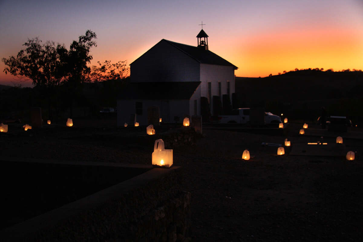 Visitors light candles in the Hornitos graveyard during the Day of the Dead each year.