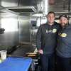 From left, owners Mike Bertanza and Eric Felitto inside a Tasty Yolk food truck in December 2018.