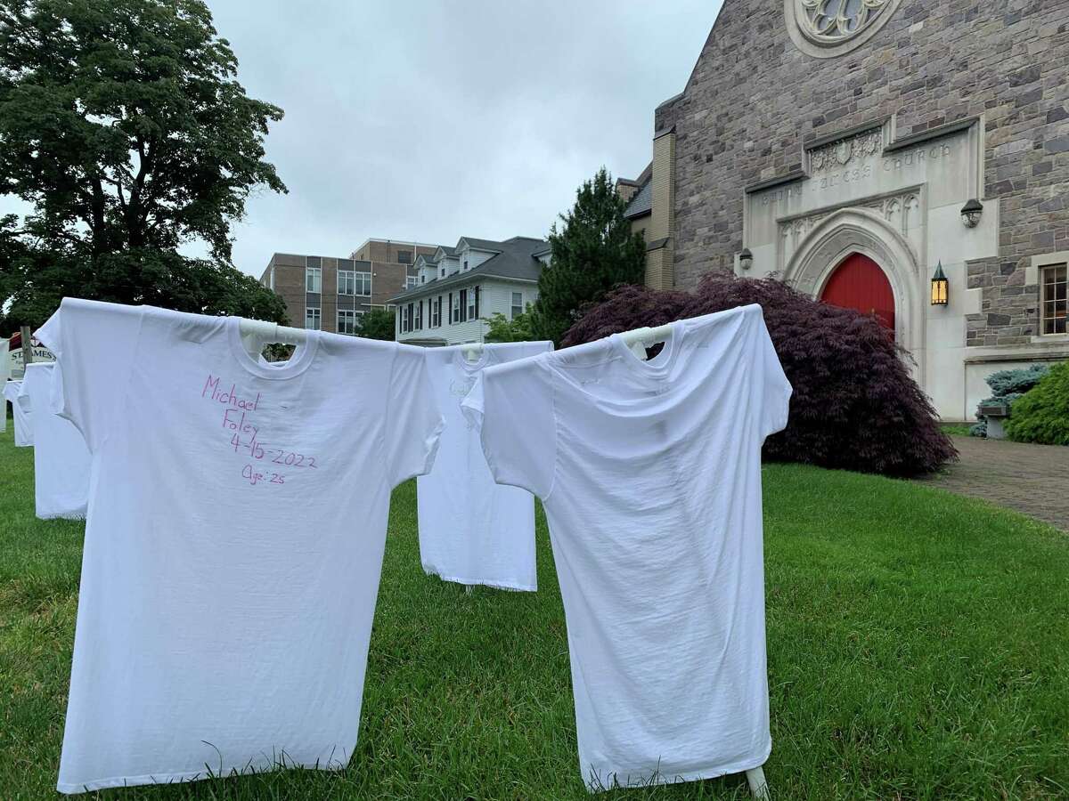 Each shirt in the memorial has the name of a victim of gun violence in Connecticut written on it. Rev. Bob Hooper said new shirts already have to be added.