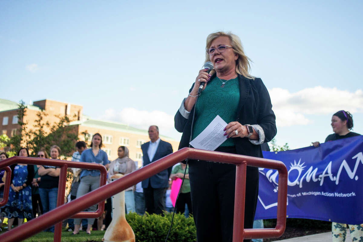 Ann Manary, a candidate for 95th State House district, addresses a crowd of hundreds of people during a rally in support of reproductive rights in reaction to the U.S. Supreme Court's decision Friday to overturn Roe v. Wade Monday, June 27, 2022 in front of the Midland County Courthouse.