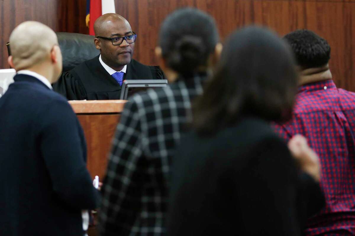 Judge Darrell Jordan goes through his docket at the Harris County Criminal Courthouse Tuesday, May 9, 2017 in Houston. Jordan has testified against other judges in Harris County in a federal lawsuit claiming that by setting high bonds for poor people accused of low-level offenses and pose no danger or flight risk, the system is set up to jail people merely because they are poor. Judge Jordan has abolished the practice in his own courtroom.