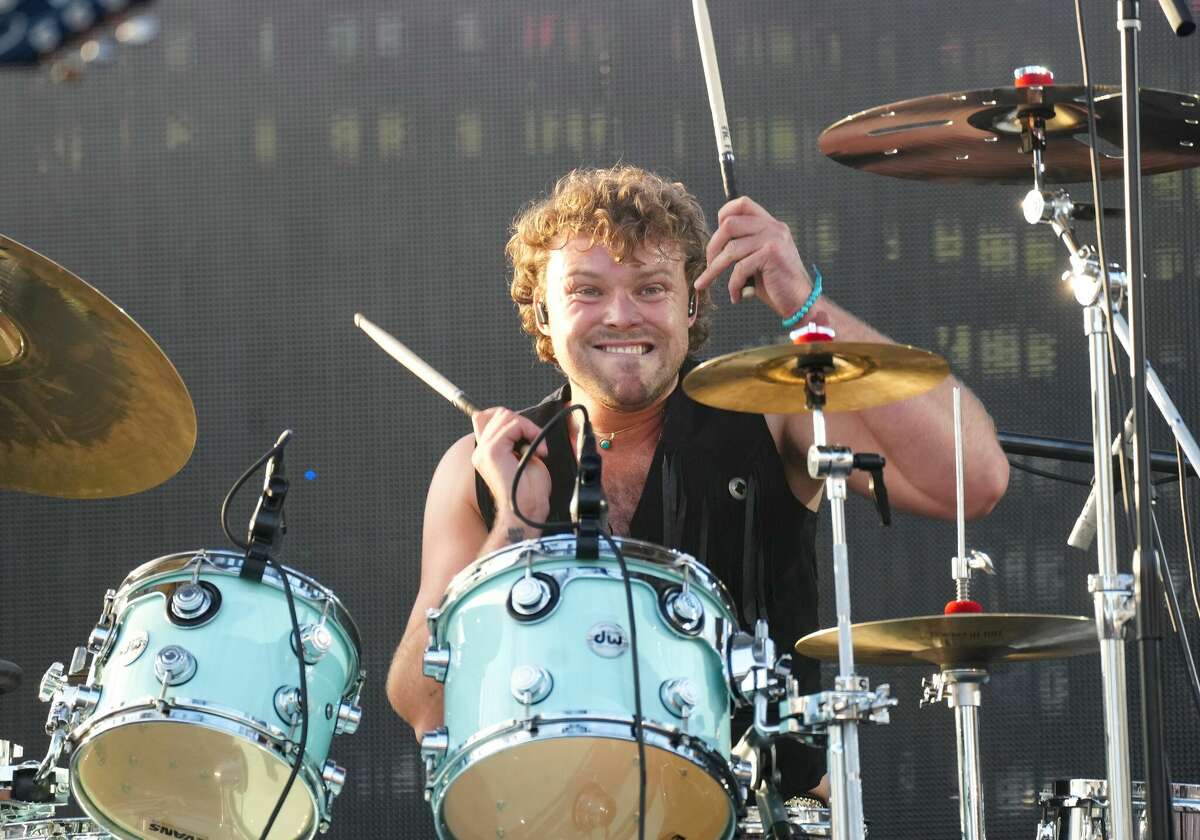 Ashton Irwin of 5SOS said he suffered stroke-like symptoms while performing at a concert in The Woodlands Sunday. 