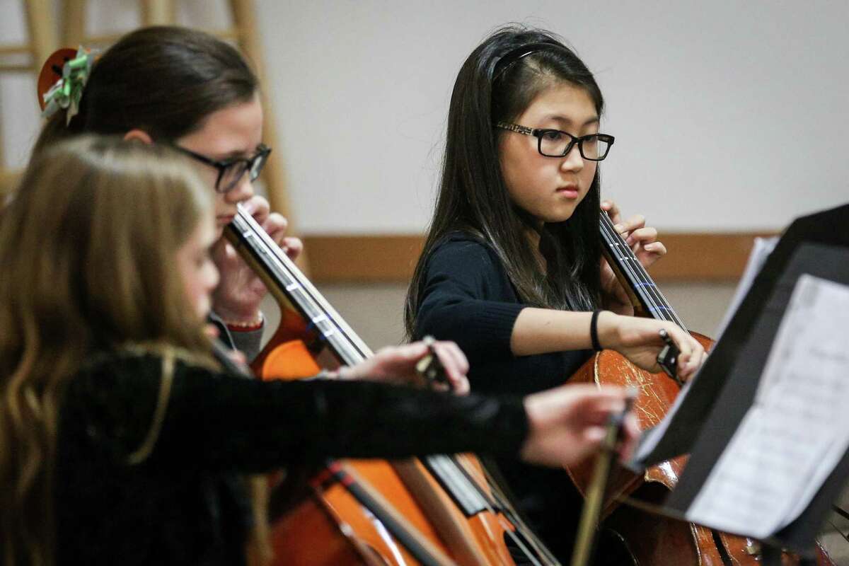 Beginner II students perform during the Conroe Symphony Youth Orchestra Christmas Concert in December 2017 at the Conroe Symphony Centre. The Conroe Symphony Youth Orchestra is rebooting its summer program and is seeking young musicians to play with the group.