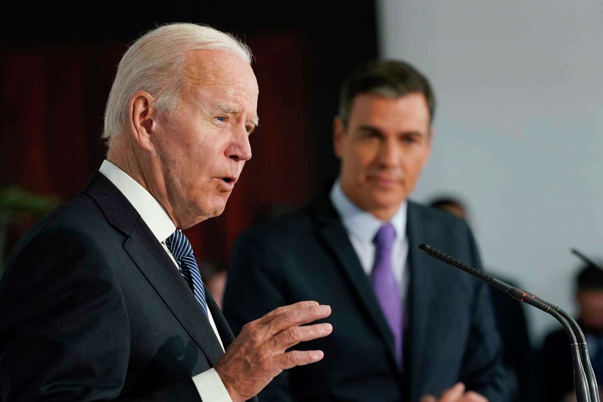 Spain's Prime Minister Pedro Sanchez listens as President Joe Biden speaks at the Palace of Moncloa in Madrid, Tuesday, June 28, 2022. Biden will also be attending the North Atlantic Treaty Organization summit in Madrid. (AP Photo/Susan Walsh)