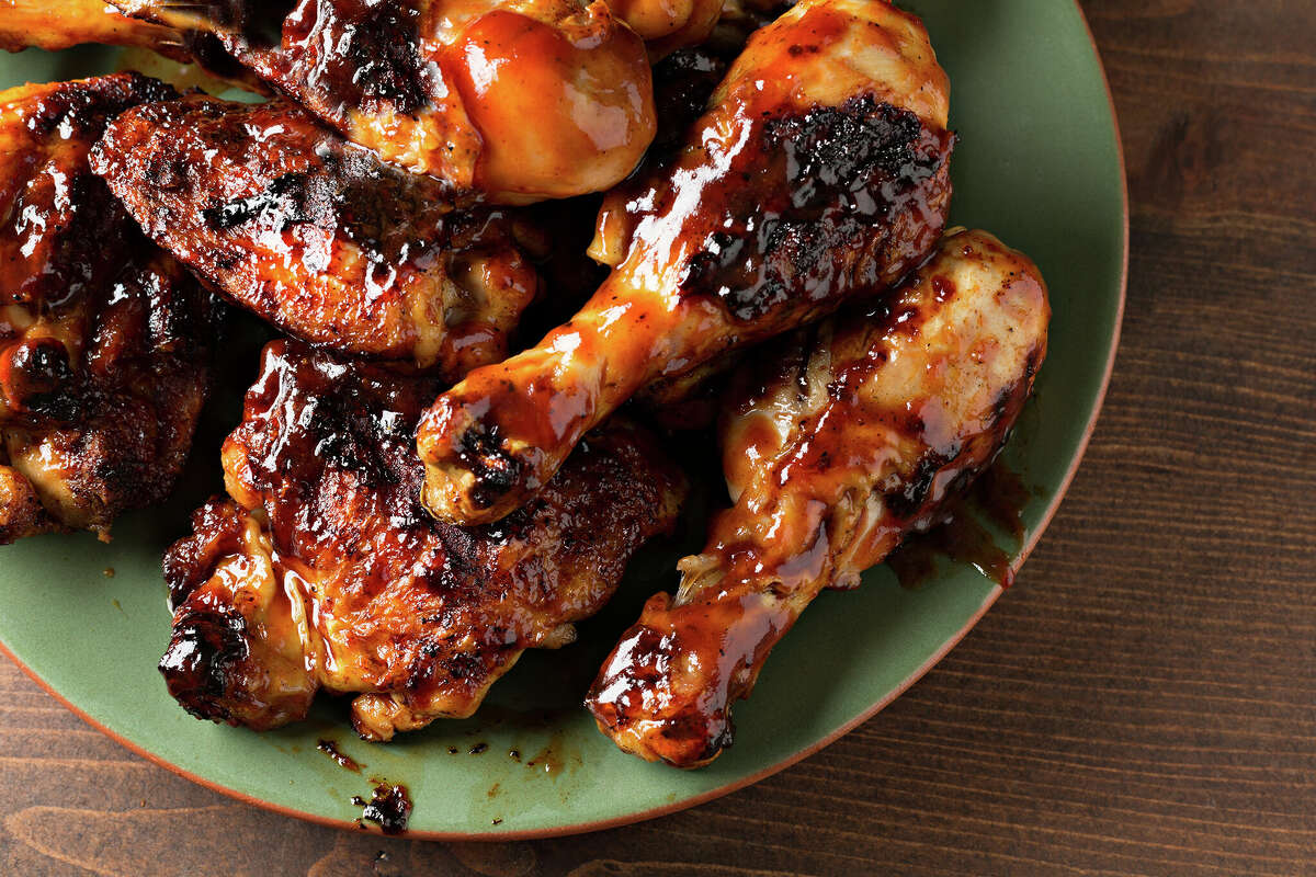 Grilled barbecued chicken has a layer of charring that adds to the deep flavor associated with grilled meats.