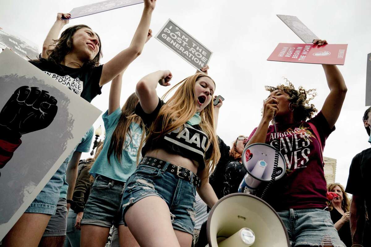 Anti-abortion demonstrators celebrate at the Supreme Court in Washington, on June 24, 2022.