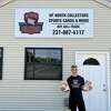 Luke Kooy, 18, is hosting a grand opening for his sports card shop, Up North Collectors Sports Cards & More, on Friday. The store is located at 237 River St.