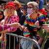 Spectators line the streets and cheer during the Pride Parade in San Francisco on Sunday, June 26, 2022.