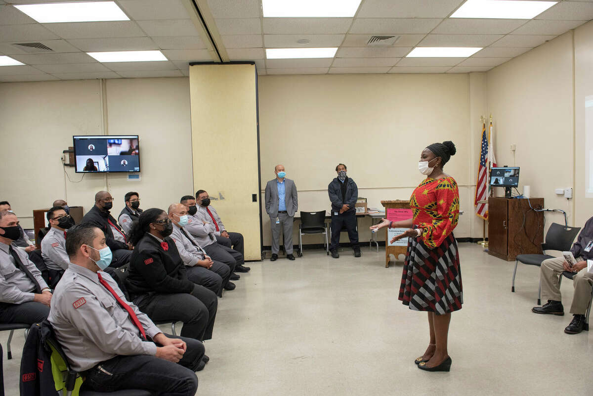 Training manager Omozele Biggins speaking at operator graduation on June 8, 2022.
