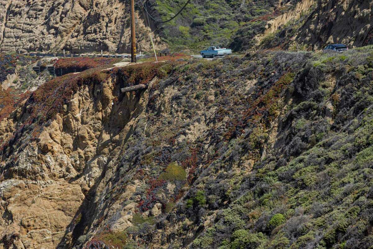 Vehicles along Highway 1 near Devil’s Slide in San Mateo County. A proposal from Caltrans would add safety barriers along the road in an effort to prevent off-roadway accidents and deaths.