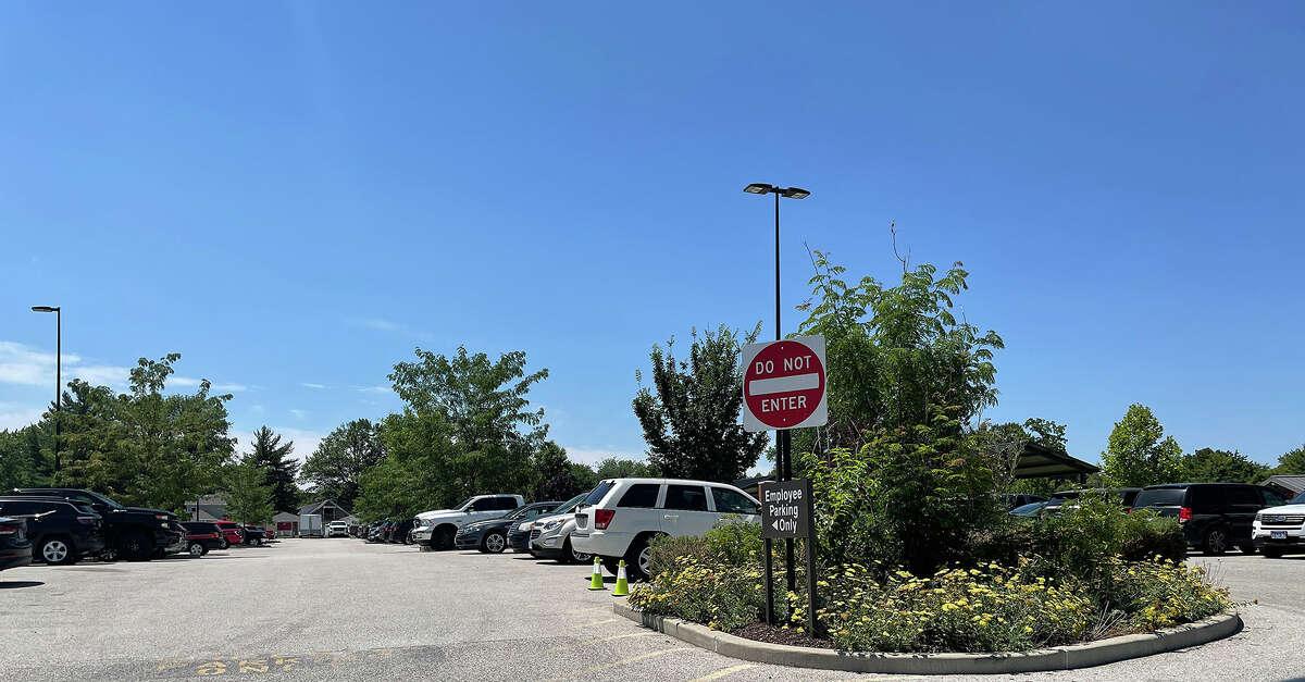 The area is currently signed, instructing civilians not to park in the area designated for city employees but not everyone sees, reads or obeys the signage. 