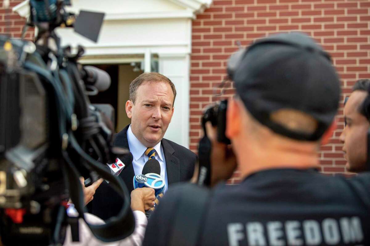 Rep. Lee Zeldin (R-N.Y.), a Republican candidate for New York governor, speaks to reporters after voting at the Mastic Beach Fire House in Mastic Beach, N.Y., June 28, 2022. (Johnny Milano/The New York Times)