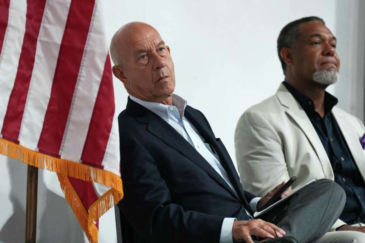 State Sen. John Whitmire, Dean of the Texas Senate, left, and Rep. Jarvis Johnson listen to speakers during a news conference and community meeting at Greater Macedonia Baptist Church Monday, June 27, 2022 in Houston.