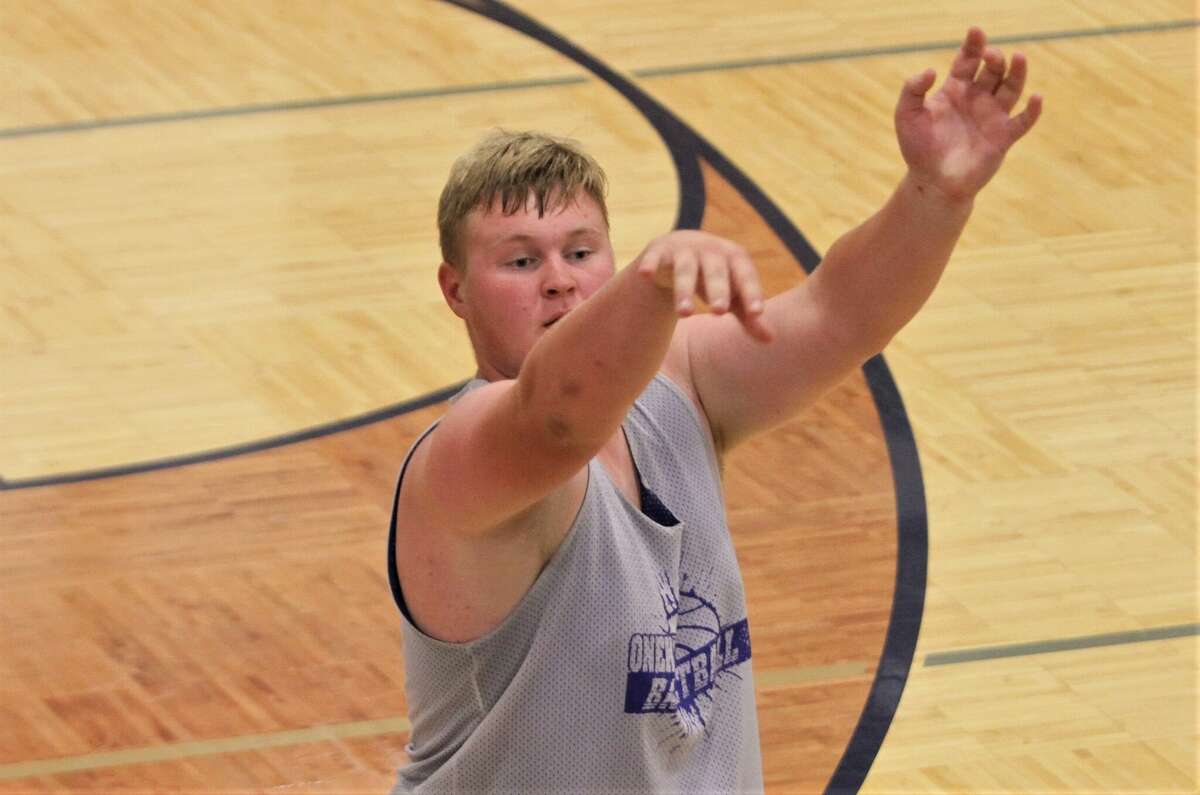 Onekama's Adam Domers follows through on a free throw attempt during the 2022 Cadillac Shoot-out. 